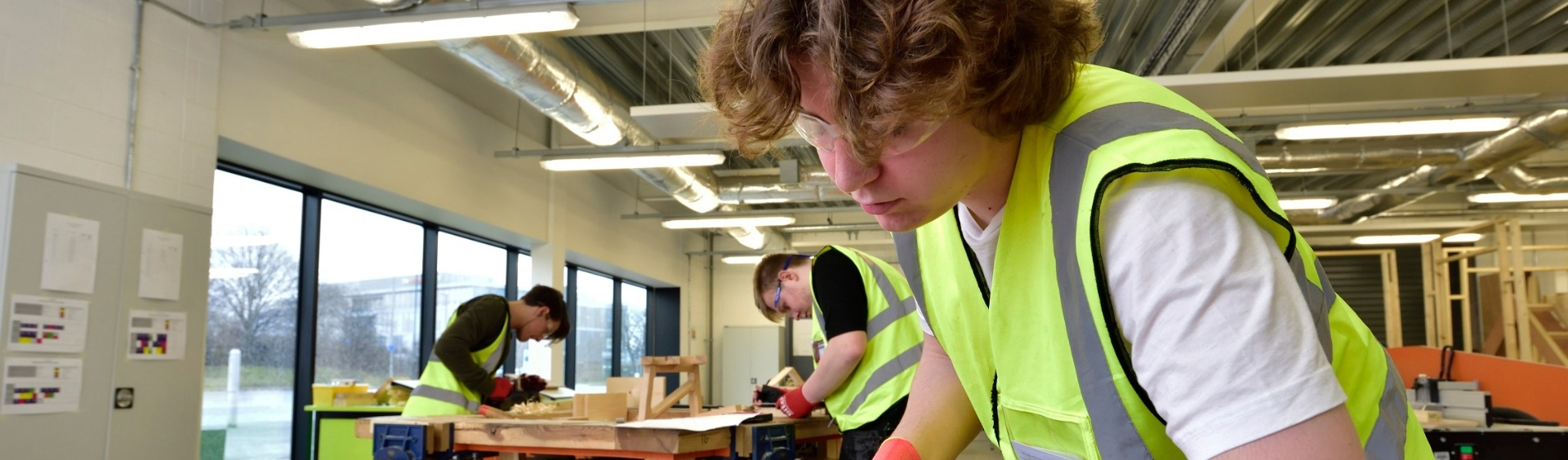 WMC Carpentry and Joinery student working inside of a classroom