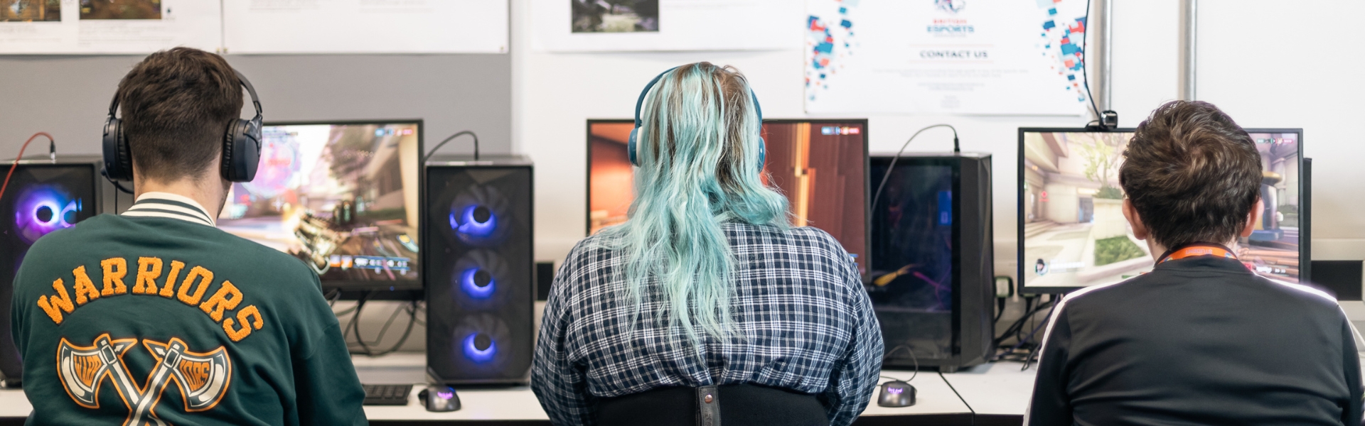 Esports students working inside computer classroom