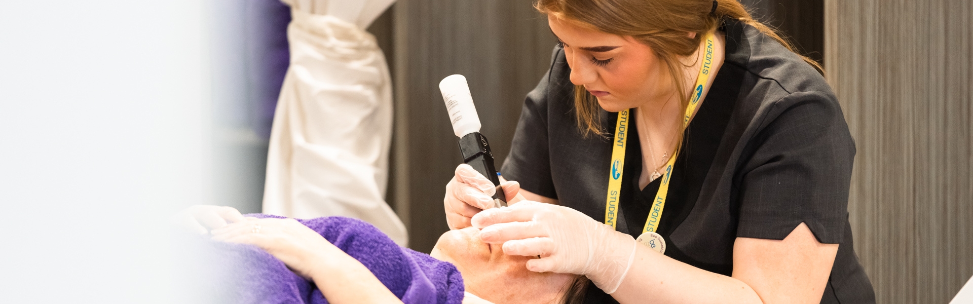 Beauty student working inside of the salon in Conway Park