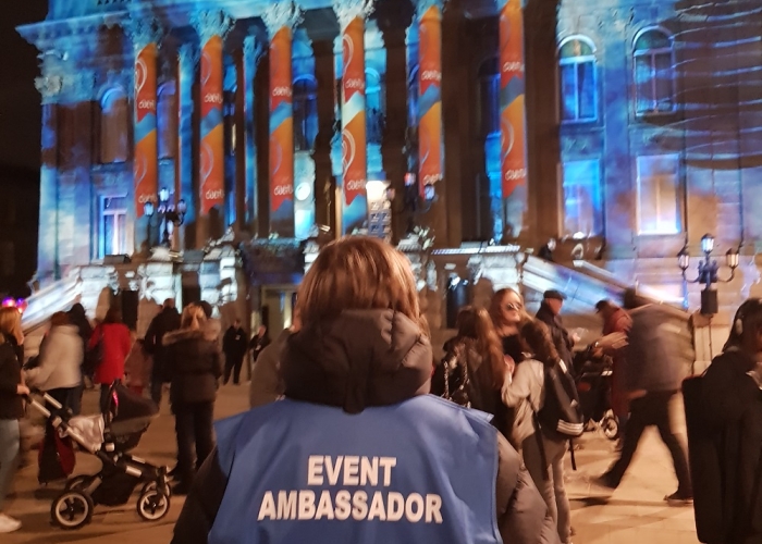 Wirral Met Students' Union Ambassador standing outside the Town Hall